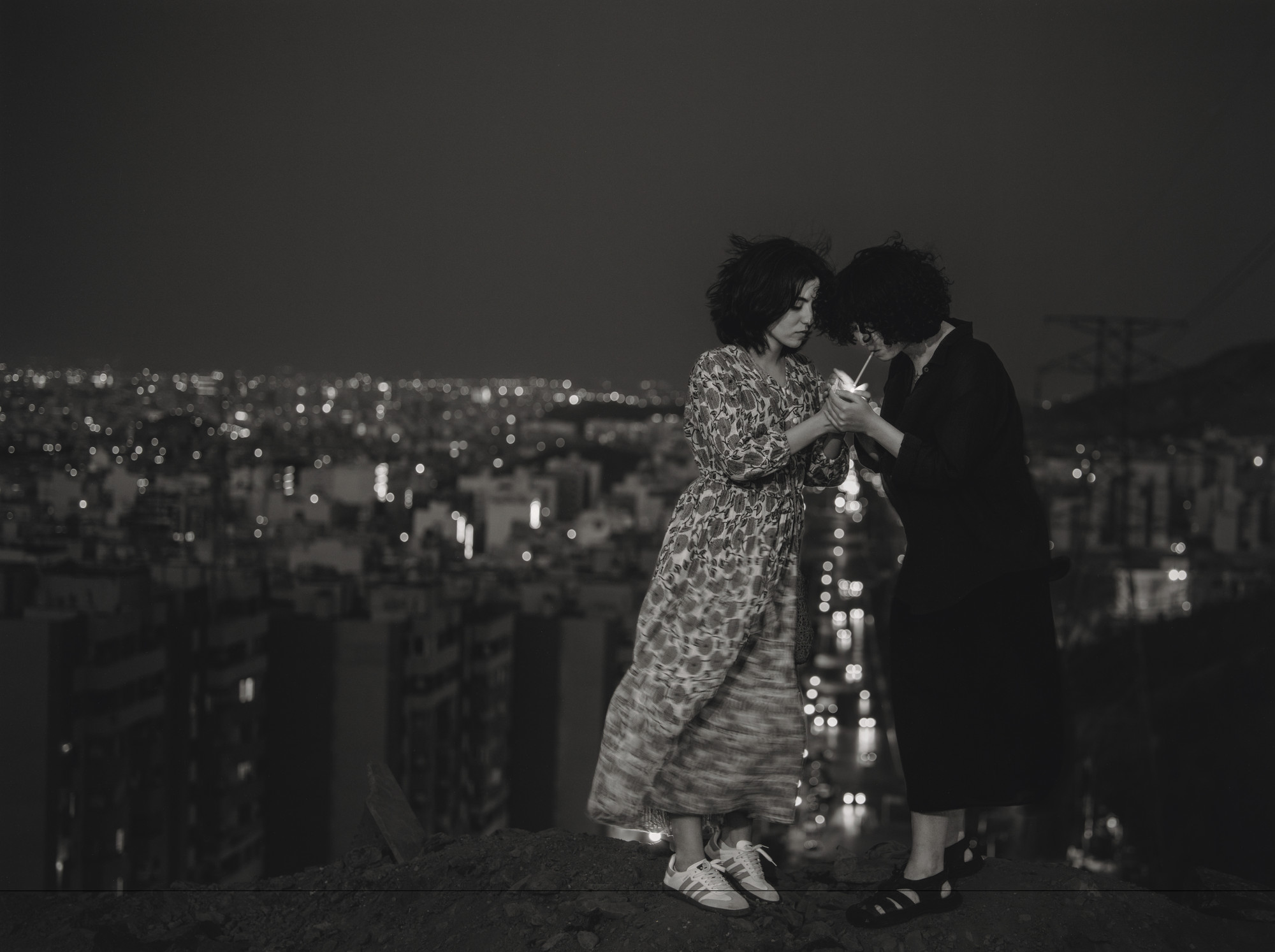 Sara Abbaspour. Untitled (lighting cigarettes)
