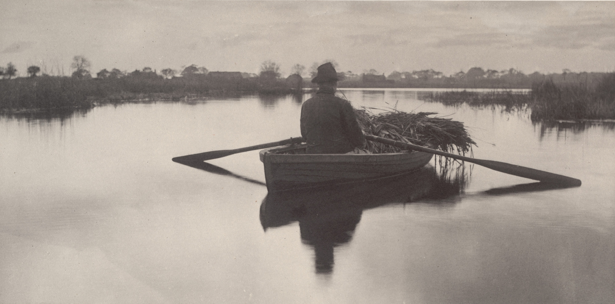 Peter Henry Emerson, T. F. Goodall. Rowing home the Schoof-Stuff from Life and Landscape on the Norfolk Broads (1886). c. 1885