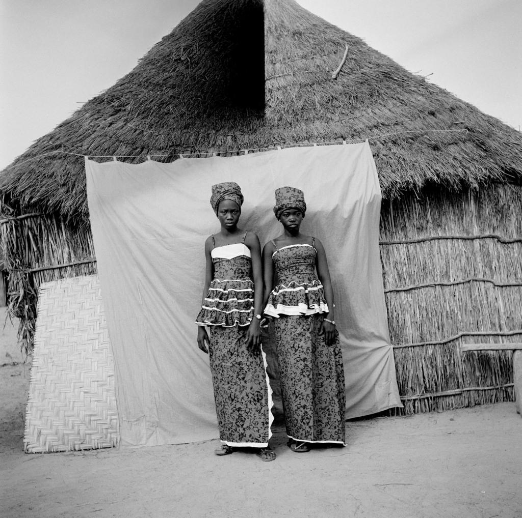 Untitled (Two Women with Thatched Roof House)
