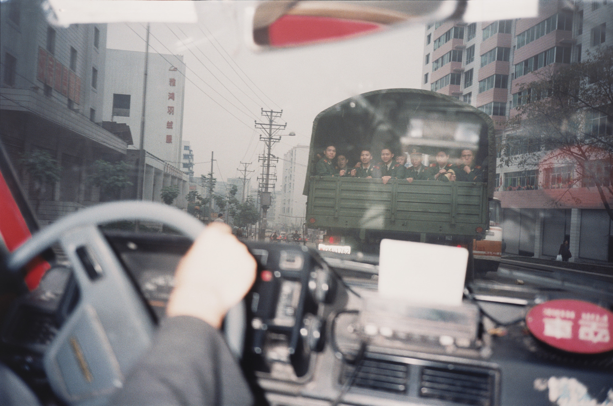 Bertien van Manen. From a Taxi, Shapingba, Chongqing. 2000