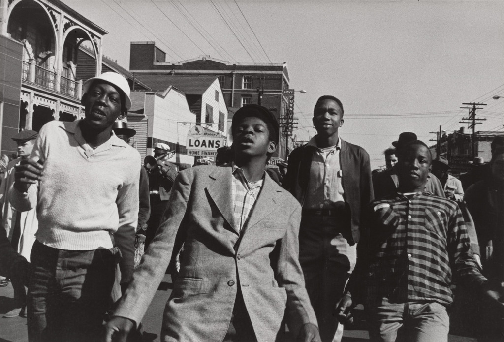 "Second-Liners" Following New Orleans Brass Band.  New Orleans, Louisiana