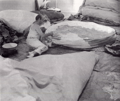 Oldenburg working on his giant soft sculptures on the floor of the Green Gallery. (MoMA P & S curatorial files)