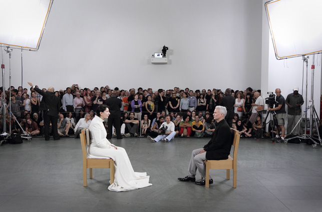 Marina Abramović with the final sitter: Klaus Biesenbach, the curator of the exhibition. © 2010 Photograph by Marco Anelli