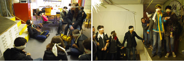 Teens begin to explore the Flux Factory space; one teen removes her blindfold, and begins taking the others through the Factory