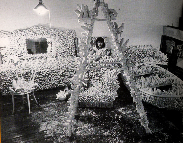 Yayoi Kusama with sculptures in her New York studio, 1963-4. © 2012 Yayoi Kusama Studio Inc.