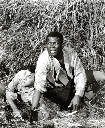 Tony Curtis and Sidney Poitier in The Defiant Ones. 1958. USA. Directed by Stanley Kramer
