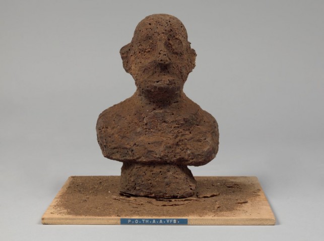 Dieter Roth. P.O.TH.A.A.VFB (Portrait of the artist as a Vogelfutterbüste [birdseed bust]). 1968. Multiple of chocolate and birdseed, overall: 8 1/4 x 5 1/2 x 4 3/4″ (21 x 14 x 12 cm). Publisher: Hake Verlag, Cologne. Fabricator: Rudolf Rieser, Cologne. Edition: 30. The Museum of Modern Art, New York. Sue and Edgar Wachenheim III Endowment Fund and acquired through the generosity of Peter H. Friedland. © 2013 Estate of Dieter Roth. Photo by John Wronn