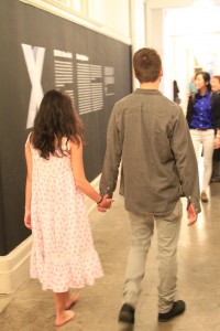 Alya Albert and Ryan McNamara holding hands as part of her performance piece