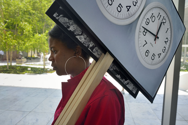 Xaviera Simmons performing Archive as Impetus (Not on View) in MoMA’s Agnes Gund Garden Lobby. Photograph courtesy of Xaviera Simmons