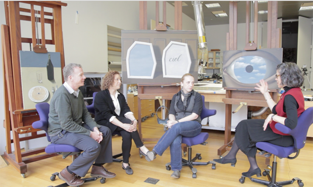 From left to right: Conservators Michael Duffy, Anny Aviram, and Cindy Albertson, and Curator Anne Umland in MoMA's Paintings Conservation Lab with René Magritte’s The False Mirror, The Palace of Curtains, III, and The Portrait From left to right: Conservators Michael Duffy, Anny Aviram, and Cindy Albertson, and Curator Anne Umland in MoMA's Paintings Conservation Lab with René Magritte’s The False Mirror, The Palace of Curtains, III, and The Portrait