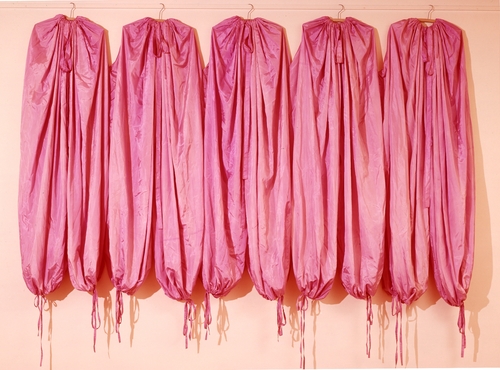 James Lee Byars. Dress for Five Persons. 1969. Fabric and hangers, overall dimensions approximately 86 x 110 x 6" (218.4 x 279.4 x 15.2 cm). The Museum of Modern Art, New York. Partial gift of the Daled Collection and partial purchase through the generosity of Maja Oeri and Hans Bodenmann, Sue and Edgar Wachenheim III, Marlene Hess and James D. Zirin, Agnes Gund, Marie-Josée and Henry R. Kravis, and Jerry I. Speyer and Katherine G. Farley