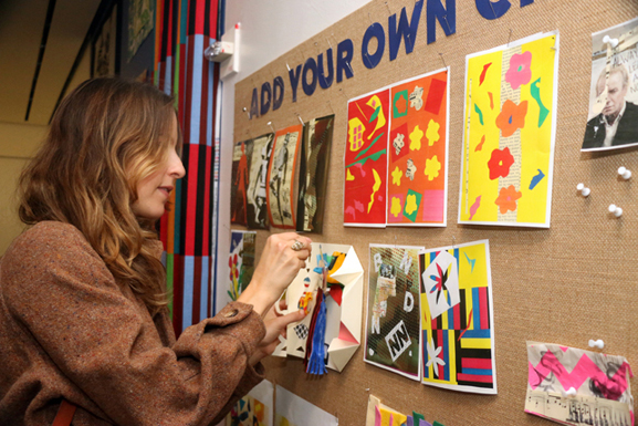 Visitor at MoMA Studio: Beyond the Cut-Out. Photo: Manuel Molina Martagon, 2014