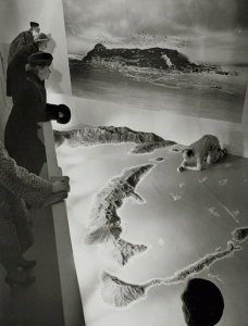 Visitors at Norman Bel Geddes’ War Maneuver Models. January 26–March 5, 1944. Photographic Archive. The Museum of Modern Art Archives, New York. Photographer unknown