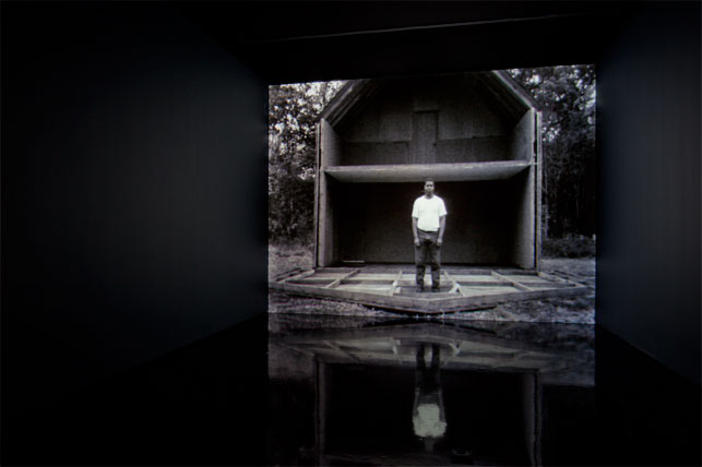 Steve McQueen. Deadpan. 1997. 16mm film transferred to video (black and white, silent), 4:35 min. The Museum of Modern Art, New York. Fractional and promised gift of Thea Westreich and Ethan Wagner. Installation view, The Museum of Modern Art 2012. Photo: Jonathan Muzikar. © 2015 The Museum of Modern Art
