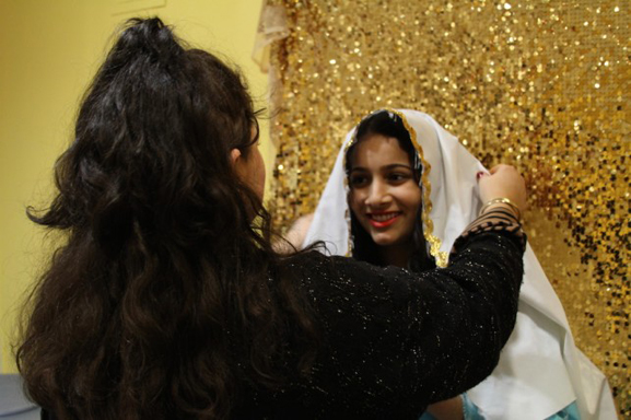 Jaimie styles "The Virgin Mary" before a photo shoot