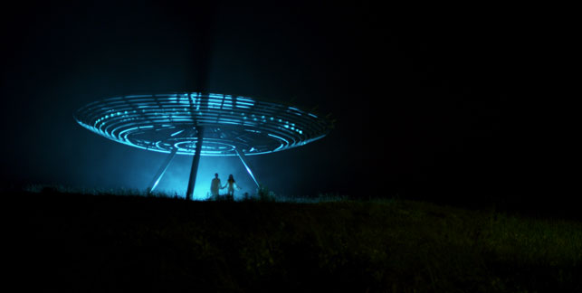 Production still from Piercing Brightness. 2013. Directed by Shezad Dawood. Courtesy of UBIK Productions Ltd. The image features Halo, an artwork by John Kennedy, commissioned by Mid Pennine Arts