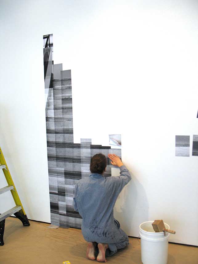 Katharina Gaenssler beginning work on the photo-mural, October 27, 2015. Photo: Kristen Gaylord
