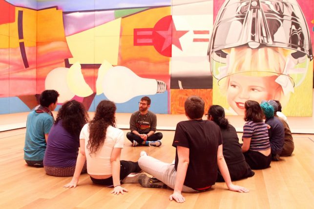 The author, center, leading OAS participants through a conversation in the galleries (Photo by Kaitlyn Stubbs)